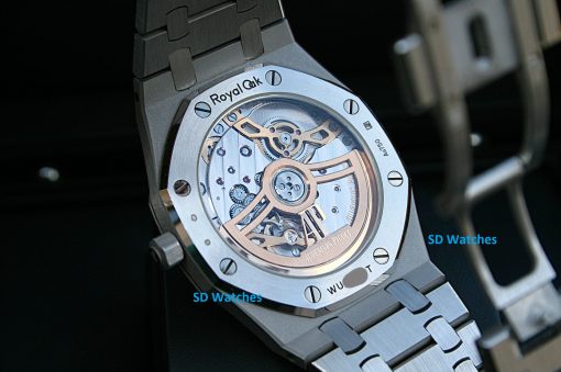 IMG_6360 | SD Watches Close-up of a Royal Oak watch back, showing intricate exposed mechanical movement and rotor.
