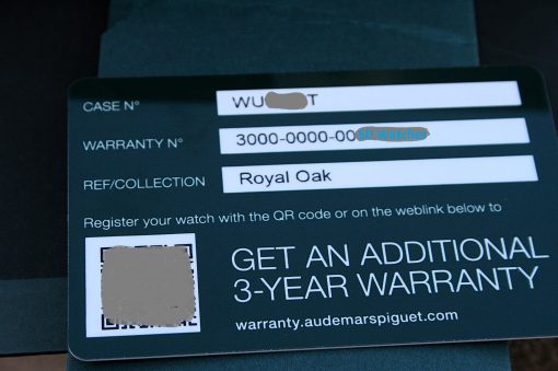 IMG_6361 | SD Watches Warranty card showing Case No, Warranty No, and Royal Oak collection for a watch (QR code area visible).