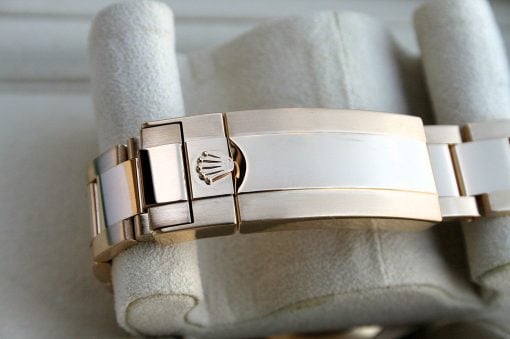 IMG_6483 | SD Watches Close-up of a two-tone metal watch bracelet with a Rolex crown emblem on the clasp.