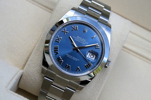 IMG_6708 | SD Watches Rolex Oyster Perpetual Datejust watch with a blue dial, Roman numeral hour markers, and a date window, in a metal bracelet box setting.