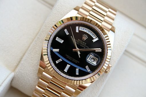IMG_6748 | SD Watches Gold Rolex Day-Date wristwatch with a black dial, fluted bezel, and diamond hour markers on a gold bracelet.