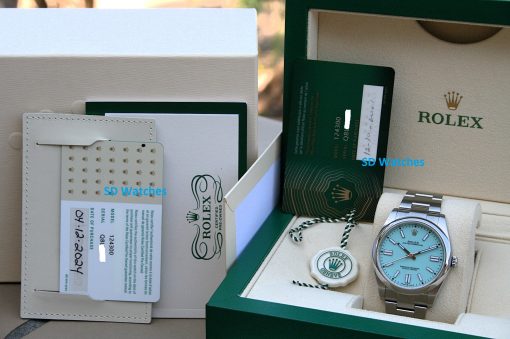 IMG_6813 | SD Watches Rolex watch in a green presentation box with warranty card and tag visible