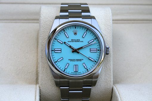 IMG_6815 | SD Watches Rolex Oyster Perpetual wristwatch with a light blue dial on a beige display cushion