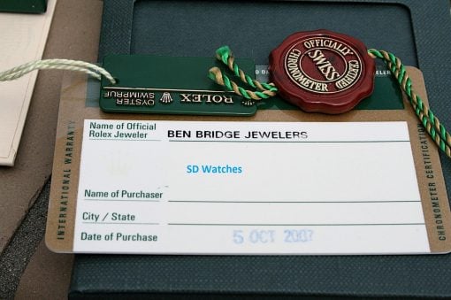 IMG_6951 | SD Watches Close-up of Rolex retailer tags and a red seal on a Ben Bridge Jewelers purchase form.