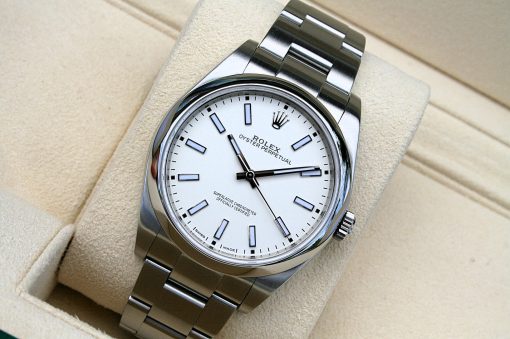 IMG_6986 | SD Watches Stainless steel Rolex Oyster Perpetual watch with a white dial resting in a beige display box