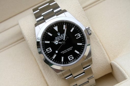 IMG_7100 | SD Watches Rolex Oyster Perpetual Explorer wristwatch with black dial on a beige cushion
