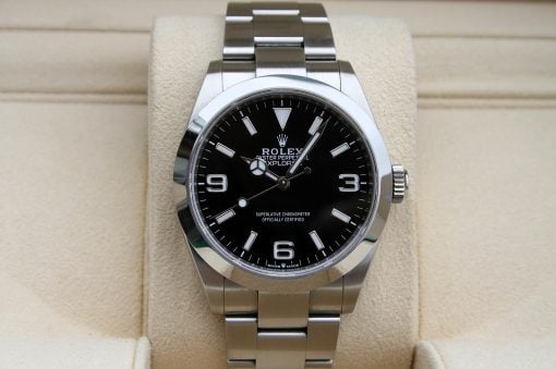 IMG_7101 | SD Watches Stainless steel Rolex watch with black dial on a beige display cushion.