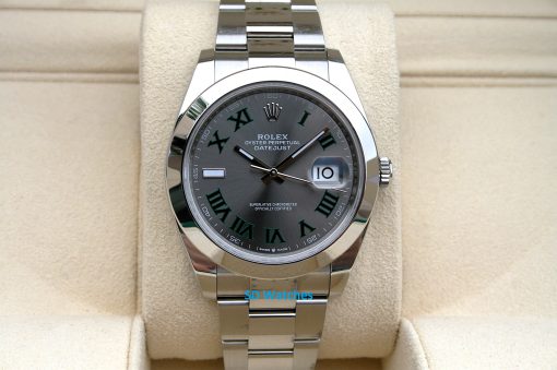 Rolex 126300 | SD Watches Rolex Oyster Perpetual Datejust stainless steel watch on a beige display cushion.