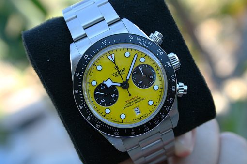 IMG_7201 | SD Watches Stainless steel Tudor chronograph with a bright yellow dial and white hour markers on a wrist bracelet. Subdials in black and day/date window visible.