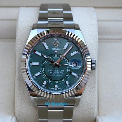 Rolex 336934 | SD Watches Rolex Sky-Dweller oyster-perpetual watch with a green dial and fluted bezel on a silver metal bracelet.