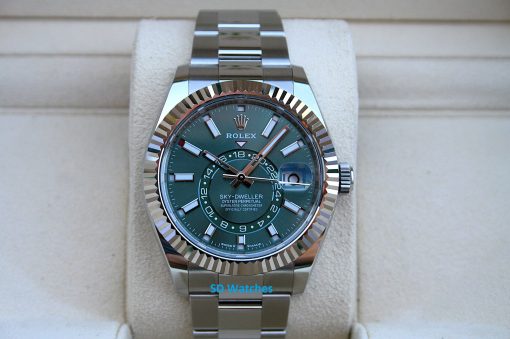 Rolex 336934 | SD Watches Rolex Sky-Dweller oyster-perpetual watch with a green dial and fluted bezel on a silver metal bracelet.