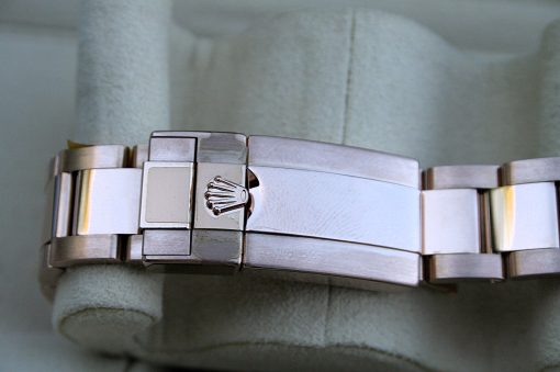IMG_7268 | SD Watches Close-up of a stainless steel Rolex watch bracelet with the crown logo on the deployant clasp
