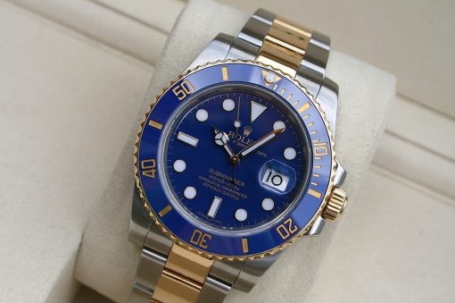 IMG_7353 | SD Watches Rolex Submariner two-tone watch with blue dial and bezel on a beige cushion display.