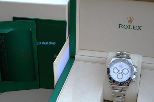 IMG_7383 | SD Watches Rolex watch displayed in an open beige presentation box with green lining and packaging.