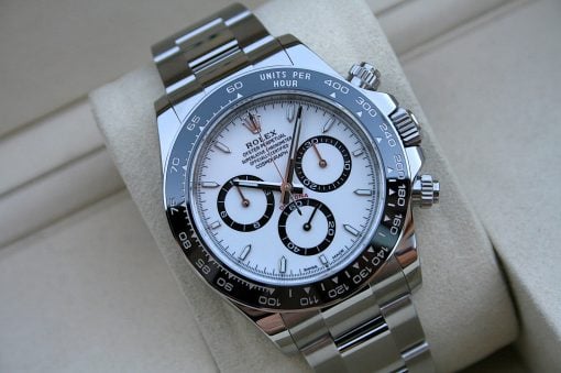 IMG_7384 | SD Watches Close-up of a silver Rolex Daytona wristwatch with a white dial and black subdials.
