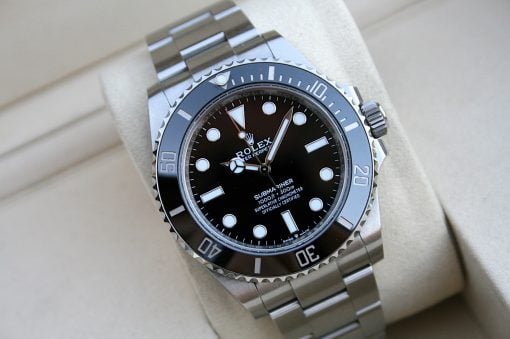 IMG_7441 | SD Watches Close-up of a Rolex Submariner dive watch with a black dial and stainless steel bracelet