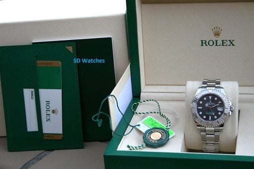 IMG_7460 | SD Watches Rolex watch displayed in a green presentation box with tags and documentation inside the case