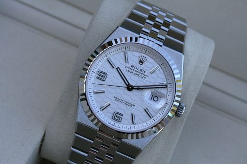 IMG_7500 | SD Watches Rolex stainless steel wristwatch with a fluted bezel, white textured dial, and date window at 3 o'clock.