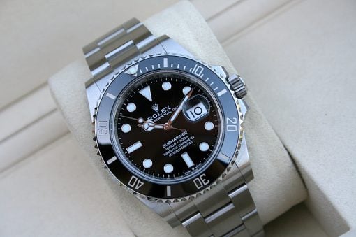 IMG_7515 | SD Watches Close-up of a stainless steel Rolex Submariner watch with black dial and silver bezel.